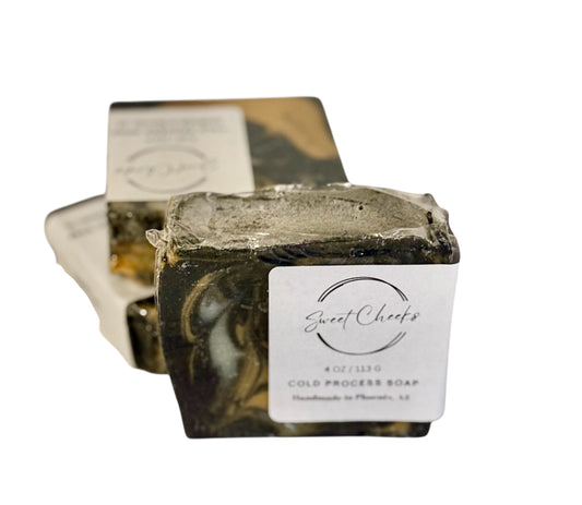 Handmade charcoal soap for deep cleansing. Detoxify and rejuvenate your skin with our luxurious cold process bar, perfect for oily and combination skin